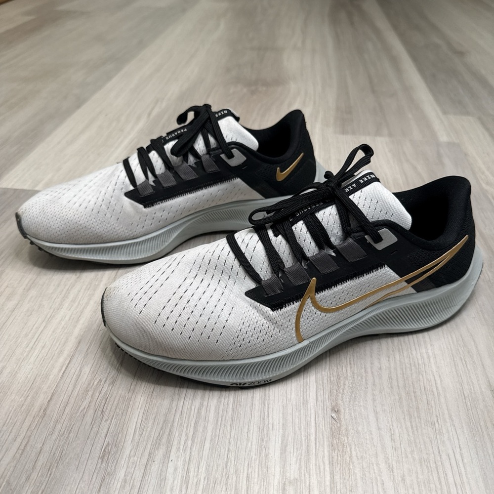 Nike Pegasus Athletic Shoes White and Black with Gold Accents